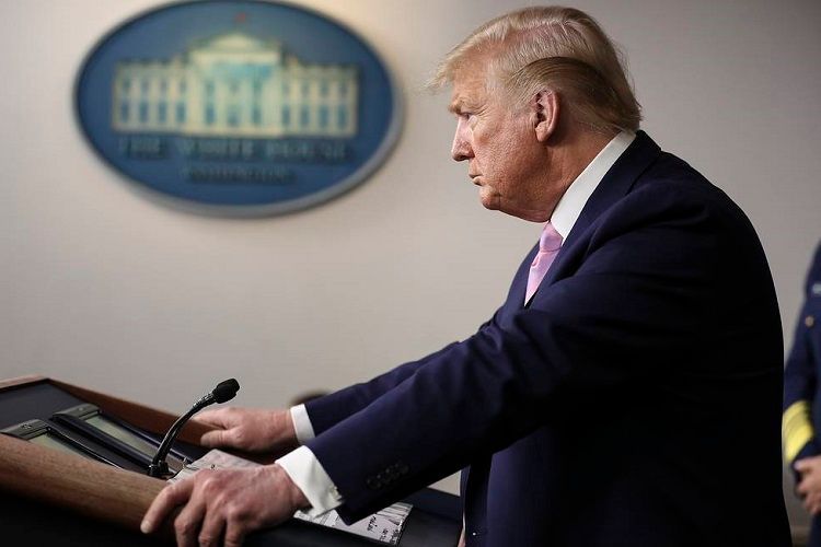 Трамп заявил, что отложил торговые переговоры с Китаем