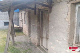 В Агстафе в доме обнаружен труп убитой женщины-ФОТО 