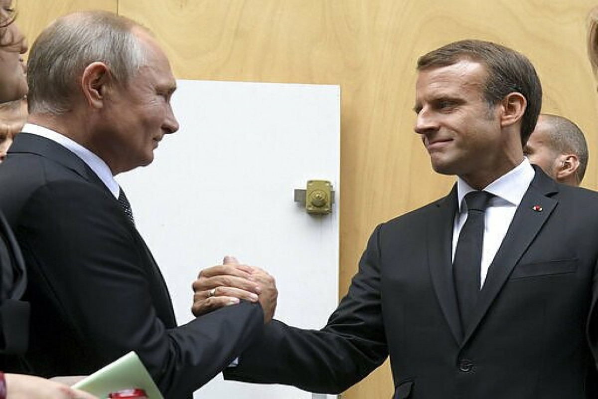 Президент России Владимир Путин и президент Франции Эммануэль Макрон