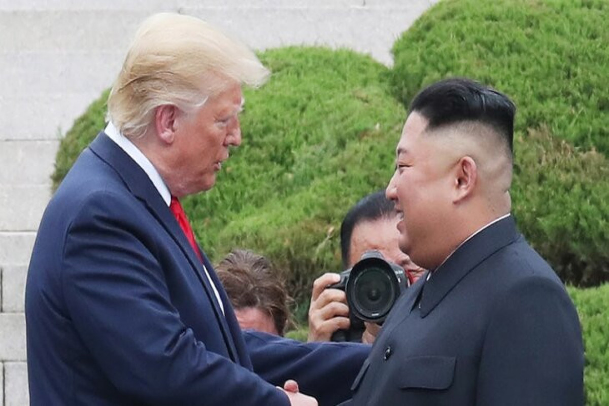 Президент США Дональд Трамп и лидер КНДР Ким Чен Ын